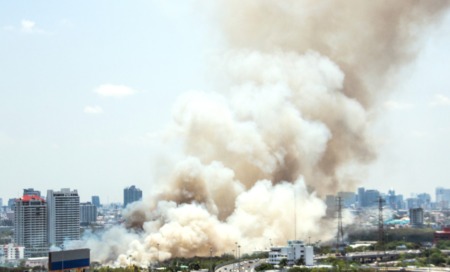 Fire and smoke in city.