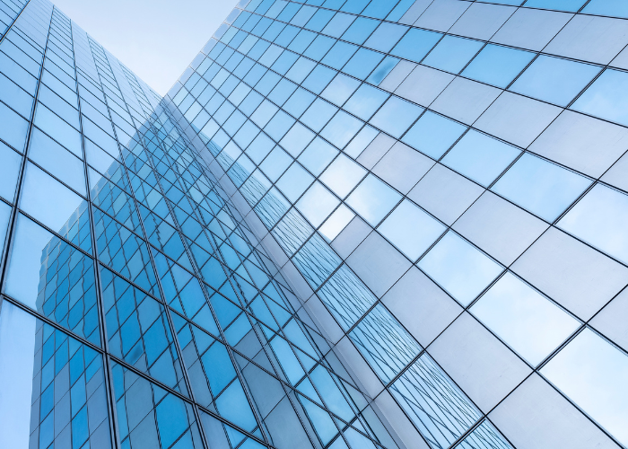 Glass windows on tall skyscraper.