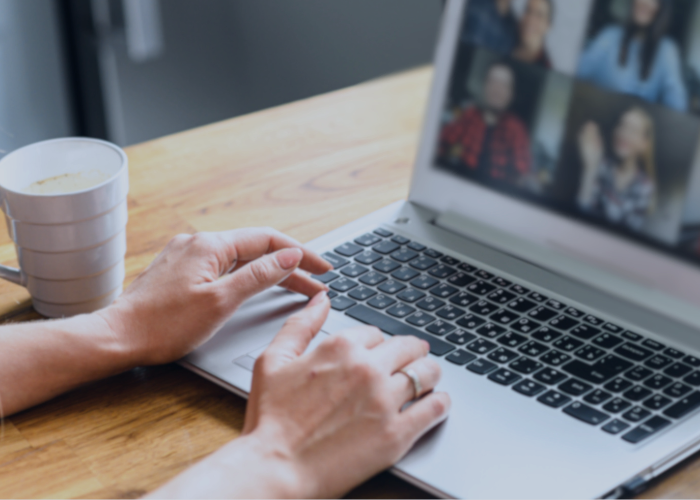People on virtual team meeting on computer screen.
