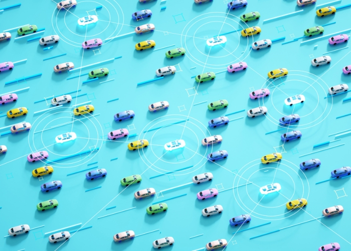 Illustrated multicolored cars connected by lines to demonstrate vehicle data privacy lawsuit