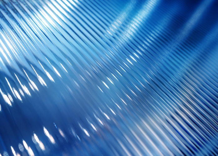 blue glass with light reflecting.