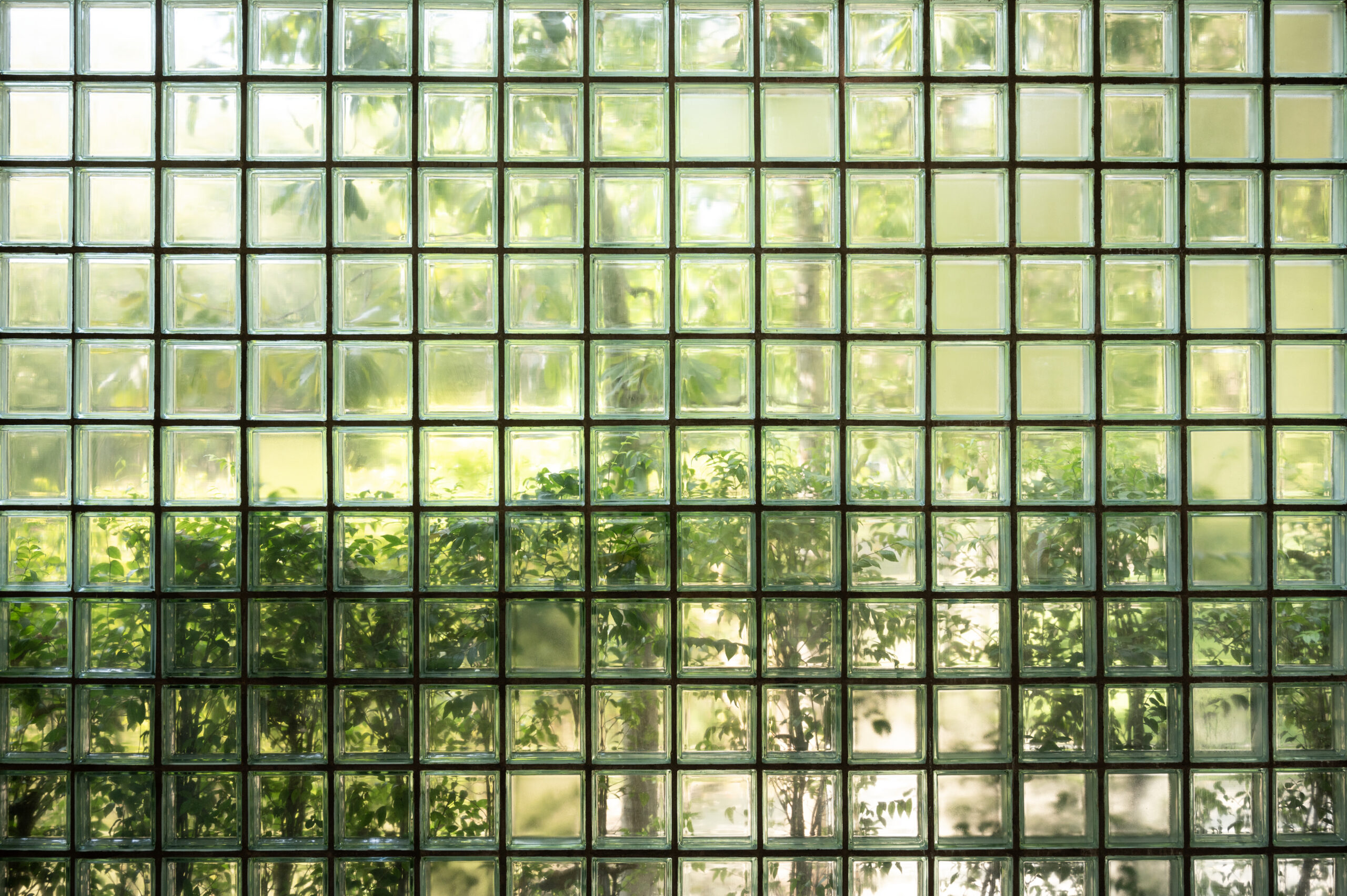 green frosted glass with geometric shapes.