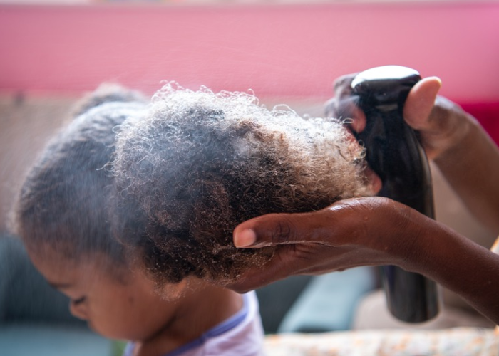 Image of Black woman and child for hair relaxer press release with Minnesota State Attorney General